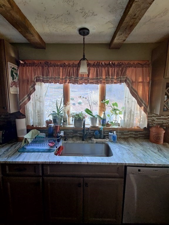 45 Fiskdale Road Brookfield, MA 01506 - Photo 17 of 36 a kitchen with sink a window and potted plant