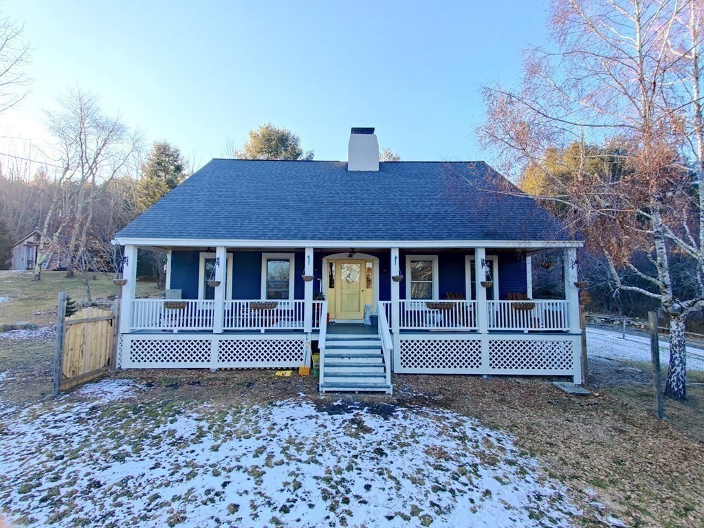 45 Fiskdale Road Brookfield, MA 01506 - Photo 3 of 36 a front view of a house with a yard