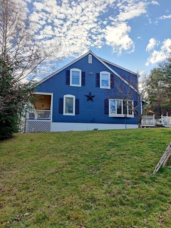 45 Fiskdale Road Brookfield, MA 01506 - Photo 8 of 36 a brick house with a yard