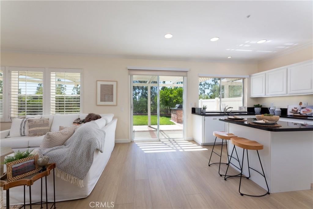 1966 Edinburgh Way Fullerton, CA 92831 - Photo 13 of 59 a living room with furniture and a large window