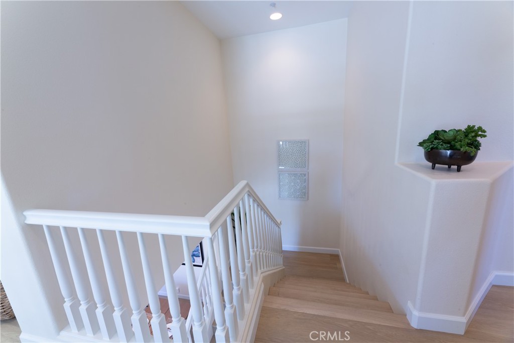 1966 Edinburgh Way Fullerton, CA 92831 - Photo 23 of 59 a view of a hallway with wooden floor
