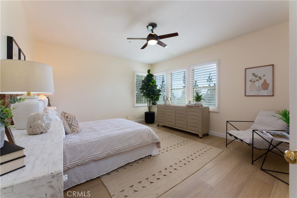 1966 Edinburgh Way Fullerton, CA 92831 - Photo 35 of 59 a bedroom with a bed and a window