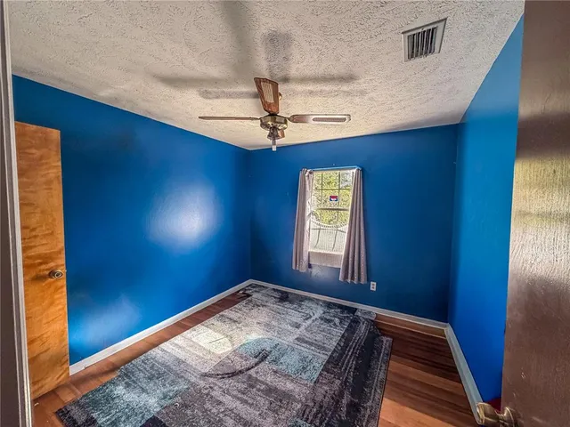 a view of hallway with a front door