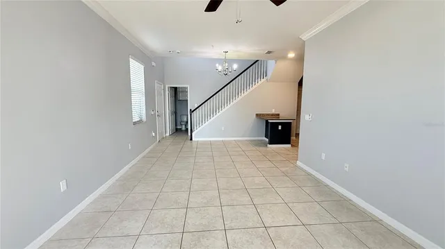 a kitchen with stainless steel appliances granite countertop a refrigerator sink and cabinets