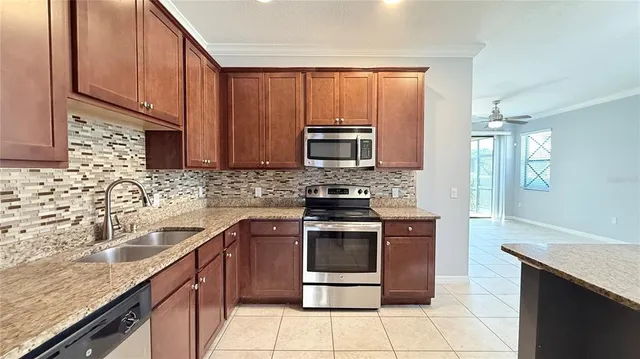 an empty room with wooden floor and closet