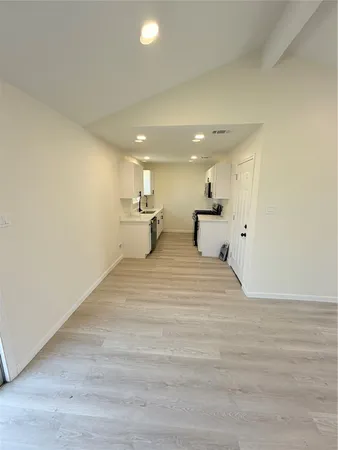 a view of kitchen and living room