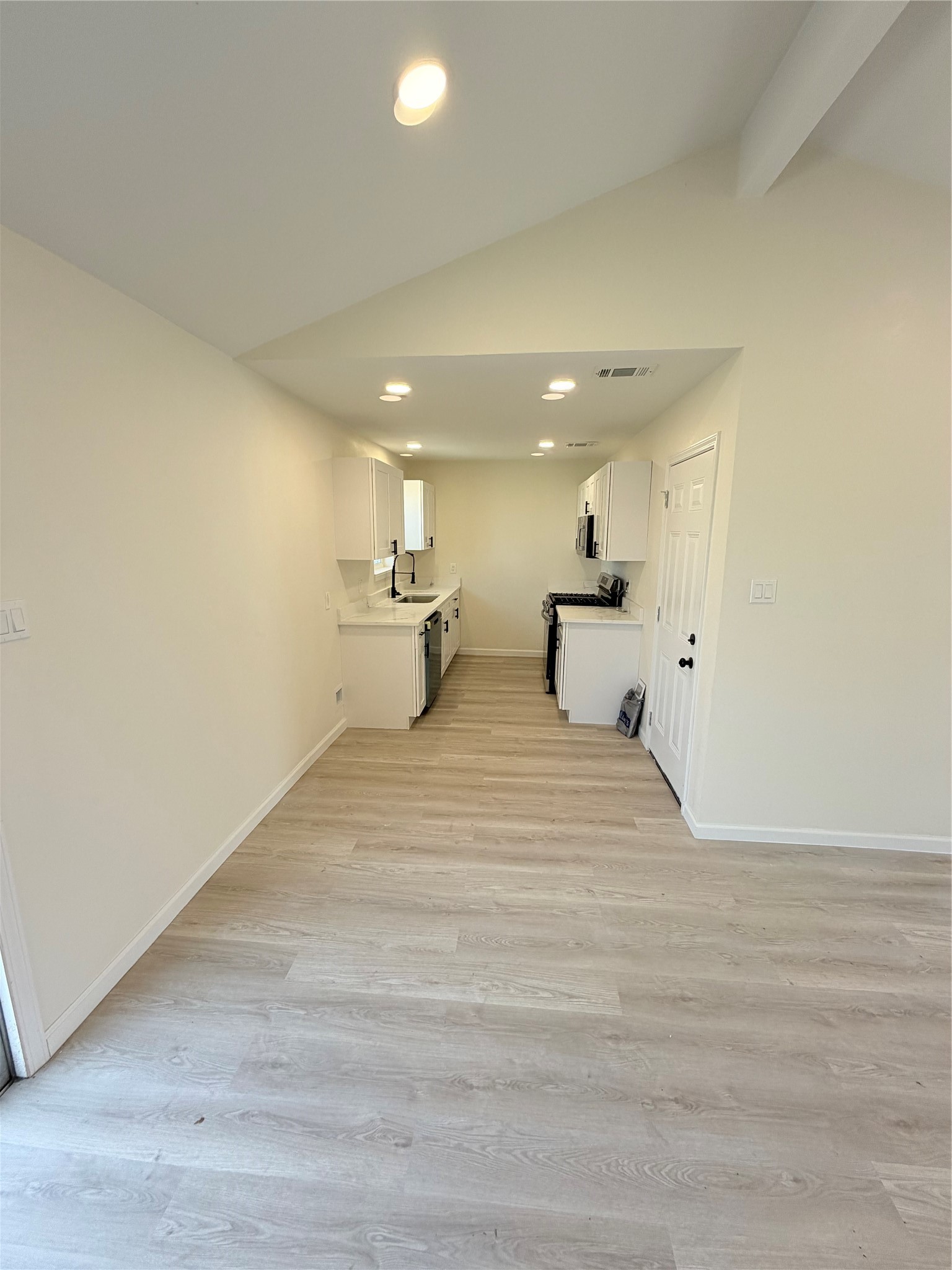 15302 Corsair Road Houston, TX 77053 - Photo 13 of 24 a view of kitchen and living room
