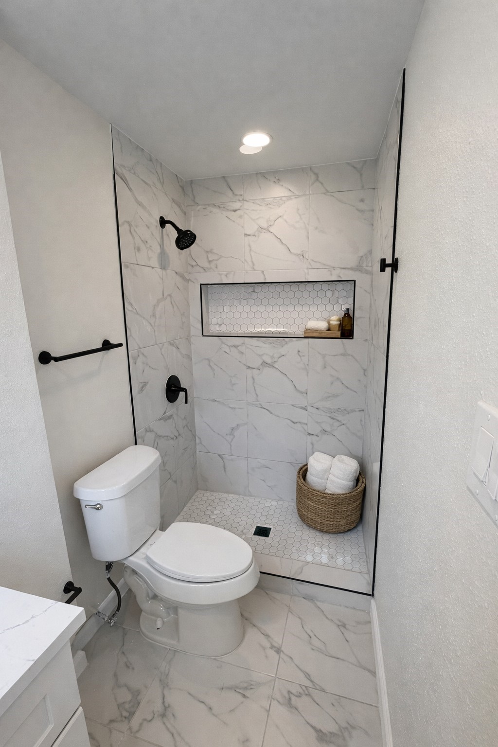 15302 Corsair Road Houston, TX 77053 - Photo 17 of 24 a bathroom with a toilet and a shower