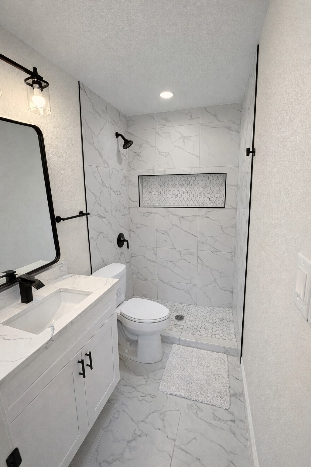 15302 Corsair Road Houston, TX 77053 - Photo 6 of 24 a bathroom with a sink a toilet and shower