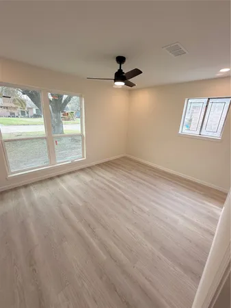 an empty room with windows