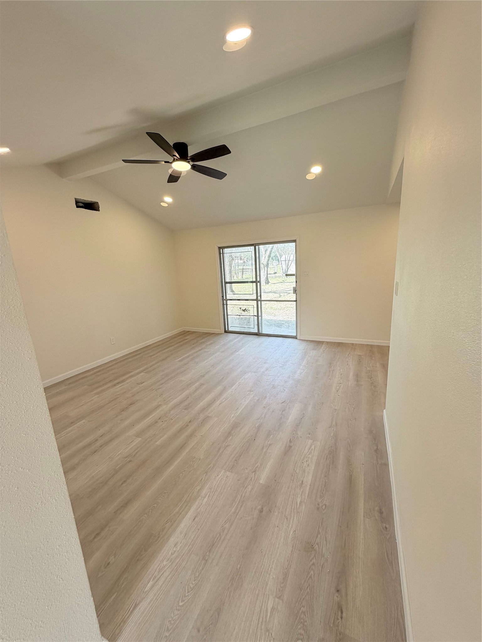 15302 Corsair Road Houston, TX 77053 - Photo 10 of 24 wooden floor in an empty room with a window