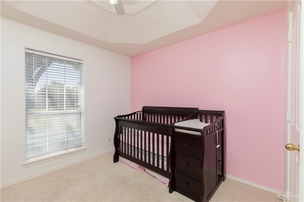 1801 Largo Street Weslaco, TX 78596 - Photo 13 of 20 a view of a livingroom with a projector
