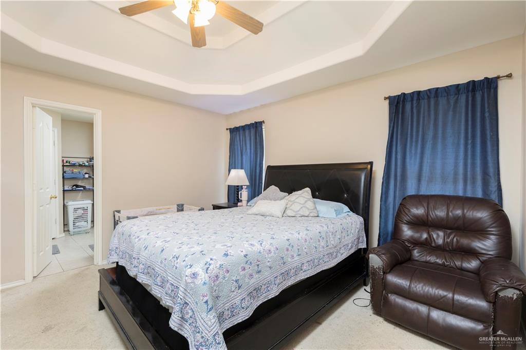1801 Largo Street Weslaco, TX 78596 - Photo 6 of 20 a bedroom with a bed and closet
