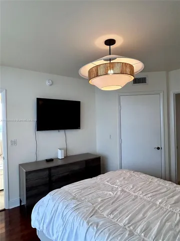 a view of a swimming pool with seating area