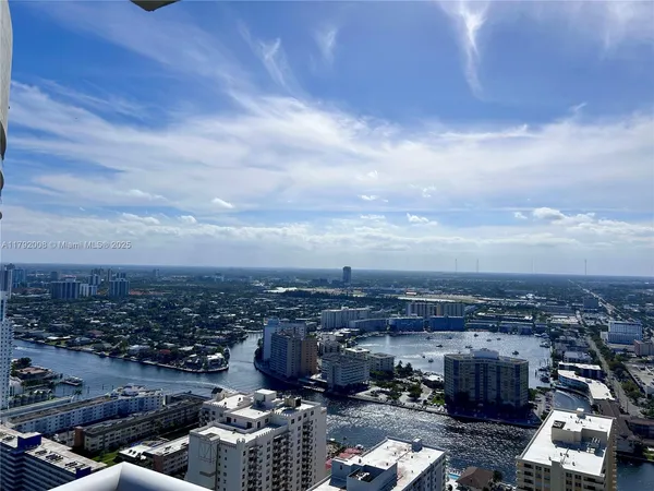 a view of a living room and dining room