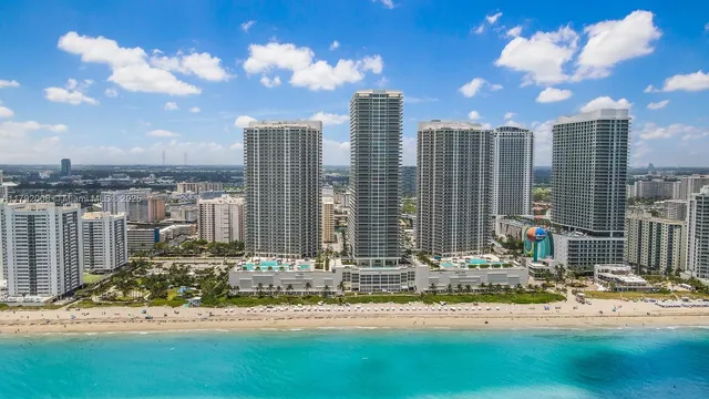 a view of a kitchen with seating area