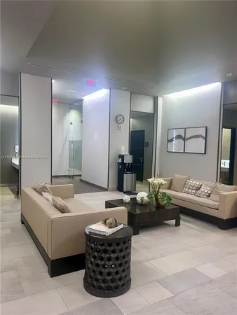 a bathroom with a shower and a mirror