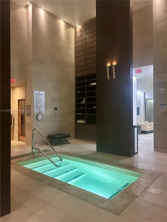 a living room with furniture and window