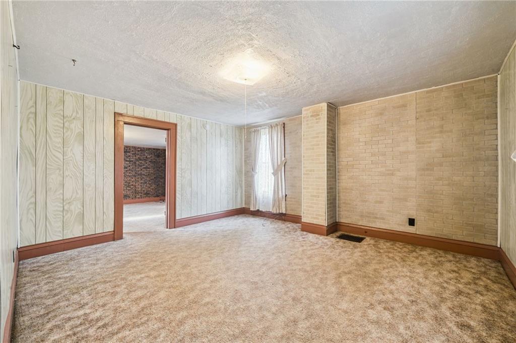 167 Hecla Road Mount Pleasant, PA 15666 - Photo 3 of 14 wooden floor and window in a room