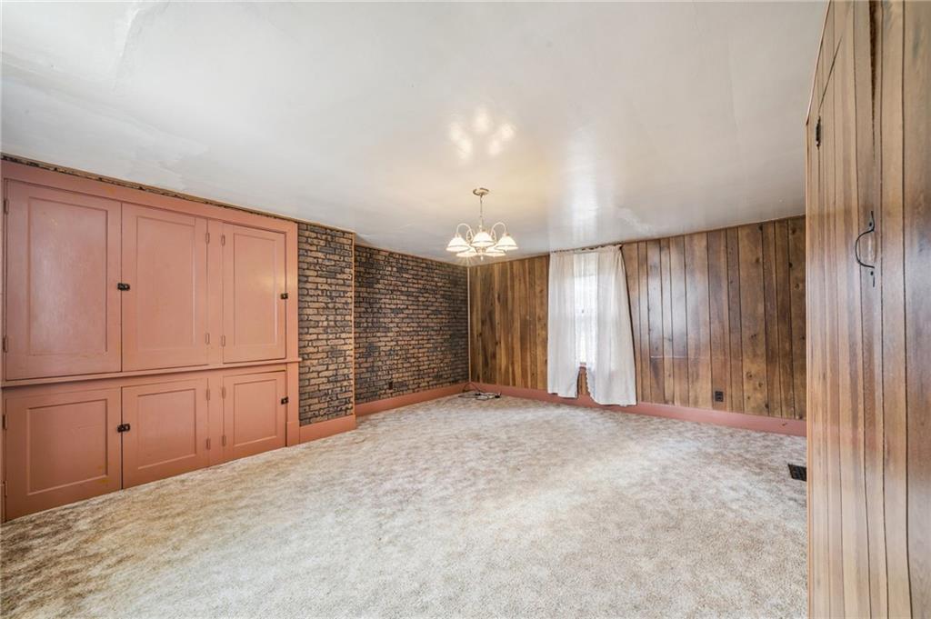 167 Hecla Road Mount Pleasant, PA 15666 - Photo 4 of 14 a view of an empty room with a kitchen
