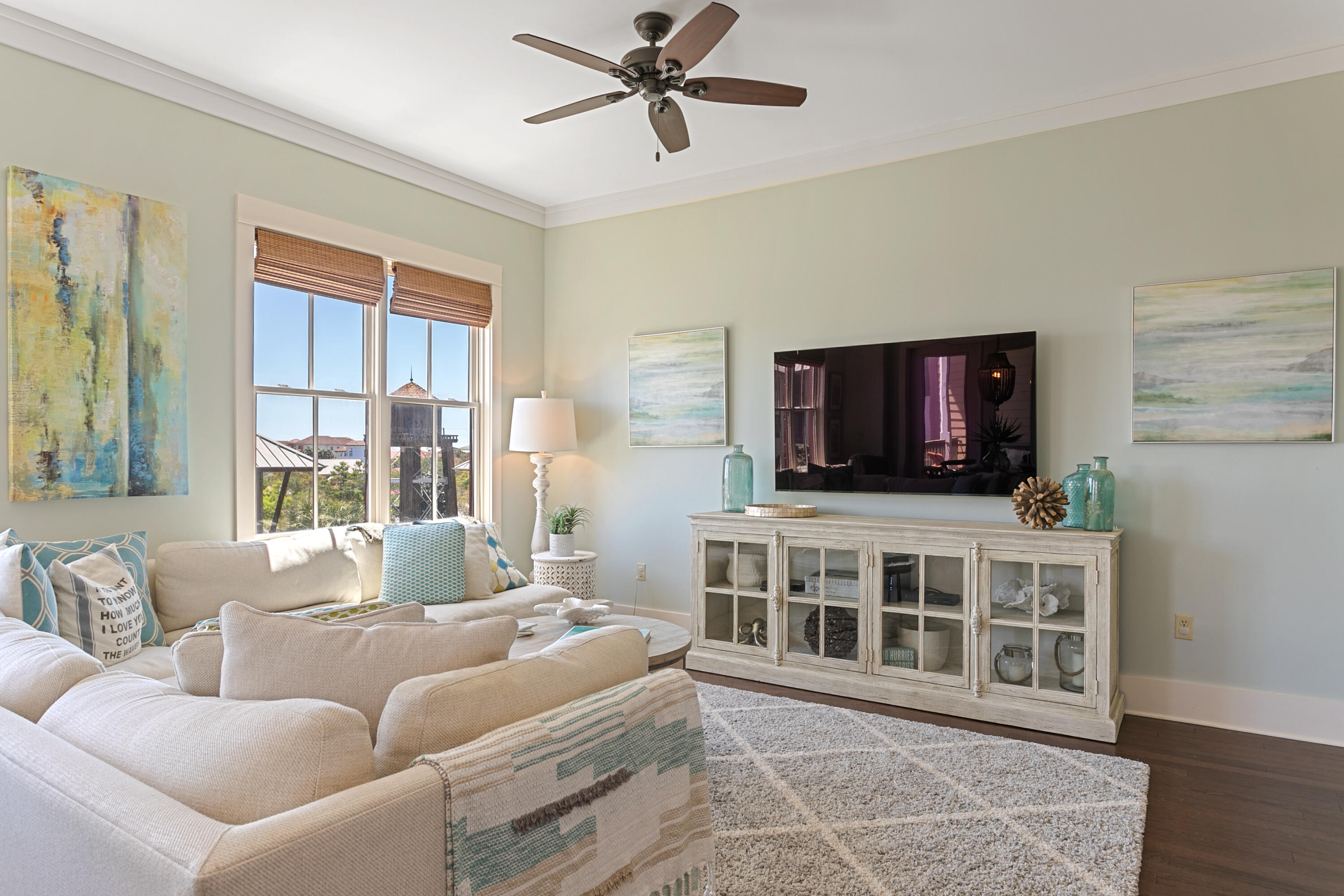 2050 West County Highway 30A, Unit M1314 Santa Rosa Beach, FL 32459 - Photo 16 of 79 a living room with furniture and a flat screen tv
