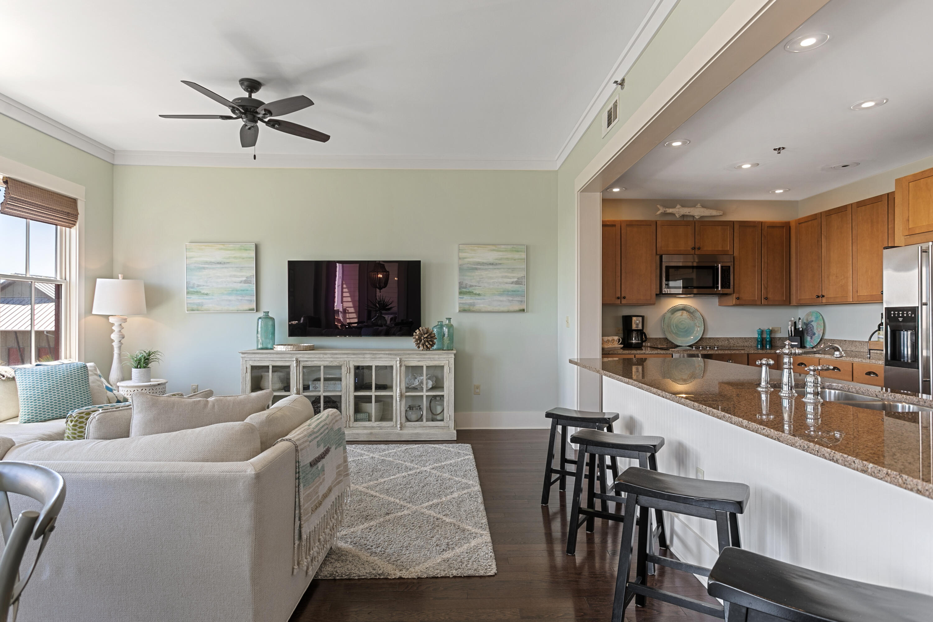 2050 West County Highway 30A, Unit M1314 Santa Rosa Beach, FL 32459 - Photo 17 of 79 a living room with furniture and a flat screen tv