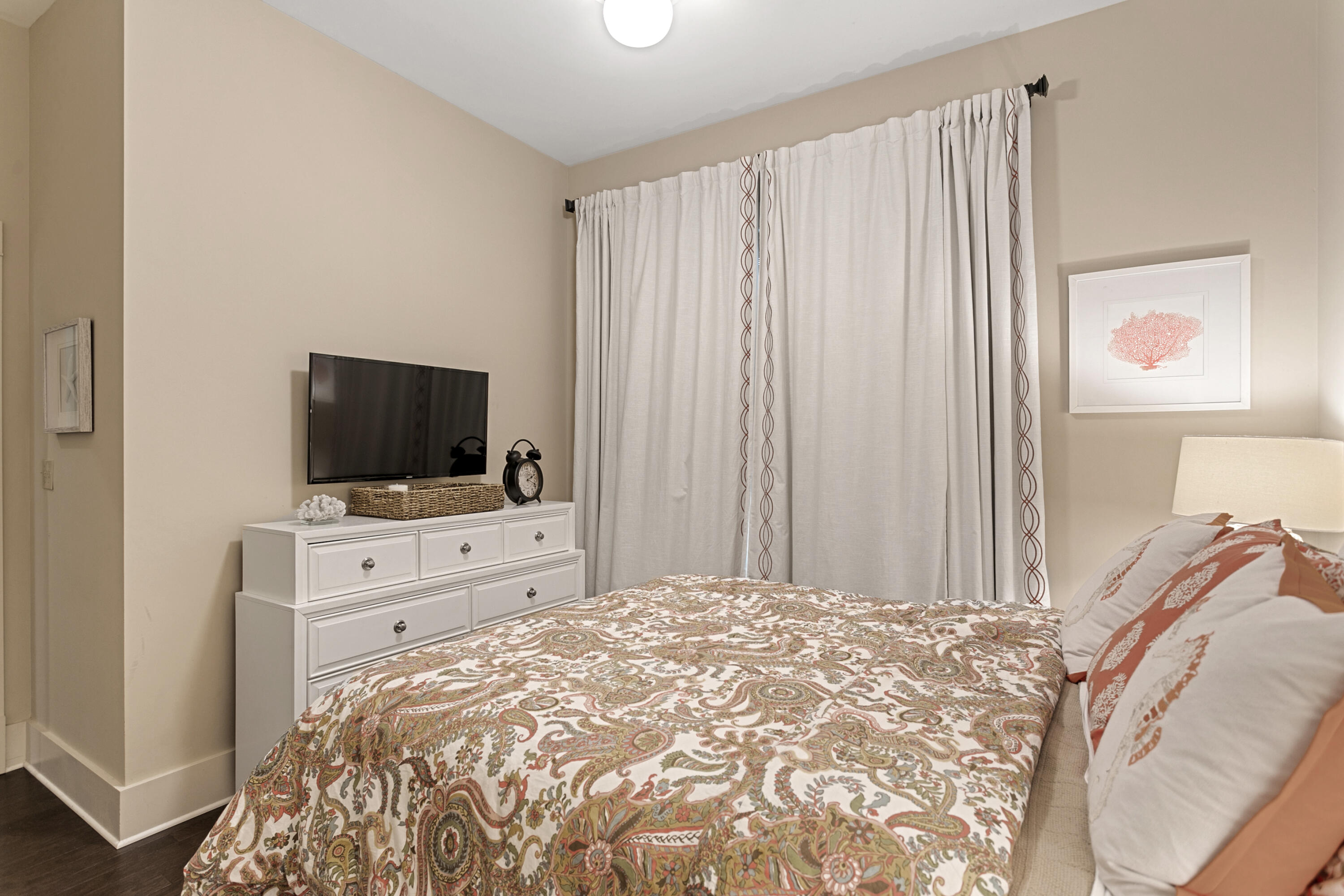 2050 West County Highway 30A, Unit M1314 Santa Rosa Beach, FL 32459 - Photo 32 of 79 a bed room with a bed a television and a window