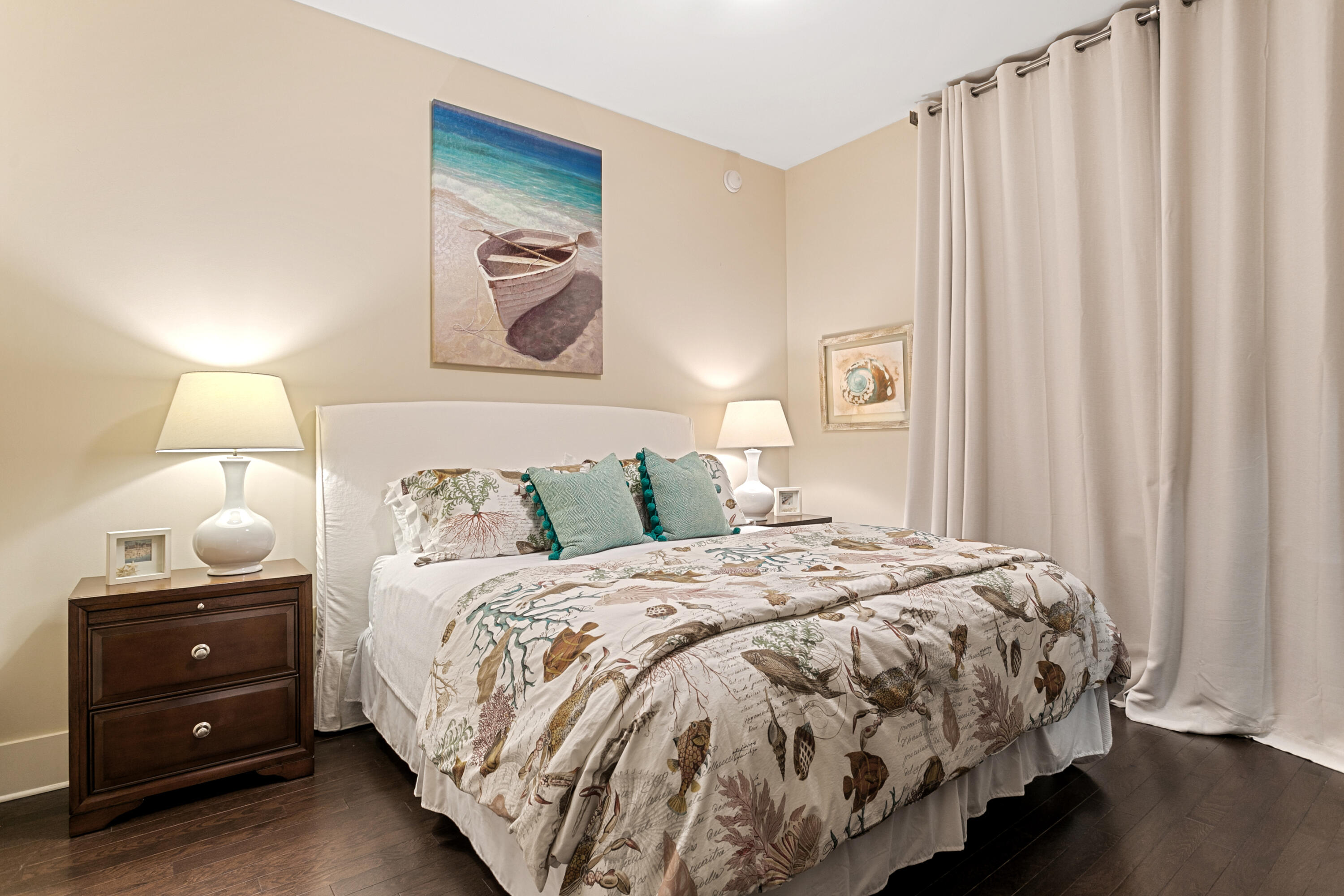 2050 West County Highway 30A, Unit M1314 Santa Rosa Beach, FL 32459 - Photo 39 of 79 a bedroom with a bed and a lamp