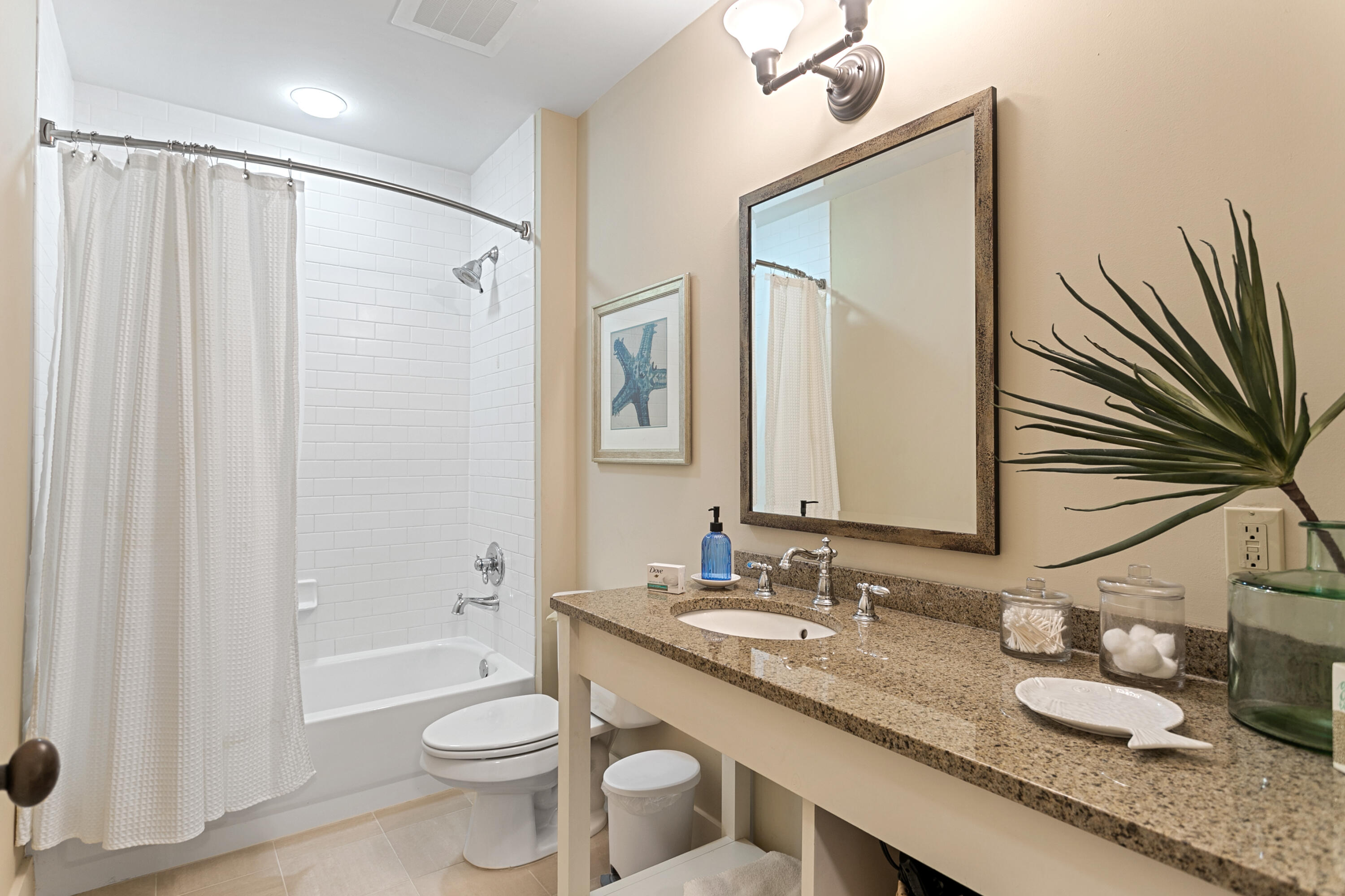 2050 West County Highway 30A, Unit M1314 Santa Rosa Beach, FL 32459 - Photo 44 of 79 a bathroom with a granite countertop sink toilet and shower