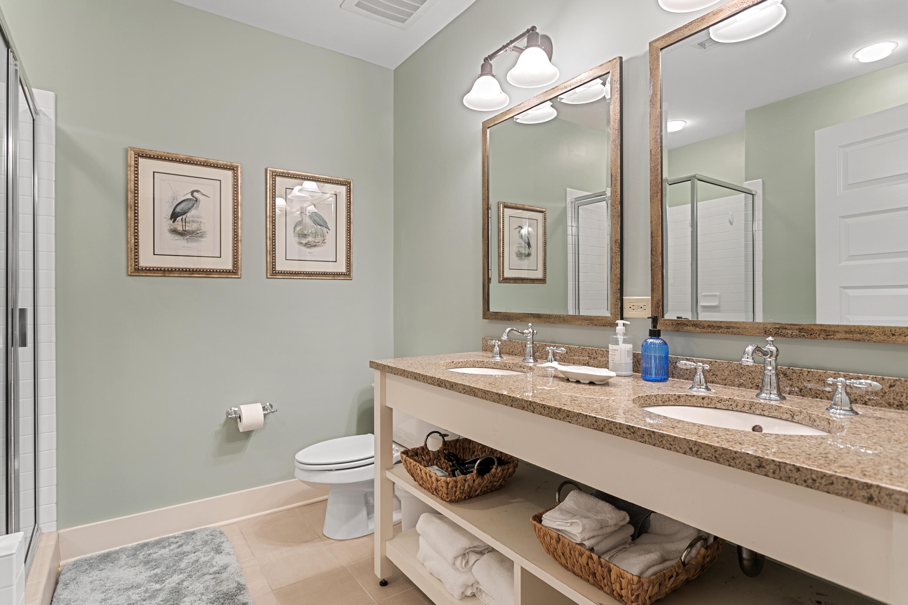 2050 West County Highway 30A, Unit M1314 Santa Rosa Beach, FL 32459 - Photo 51 of 79 a bathroom with a granite countertop sink a toilet and a mirror