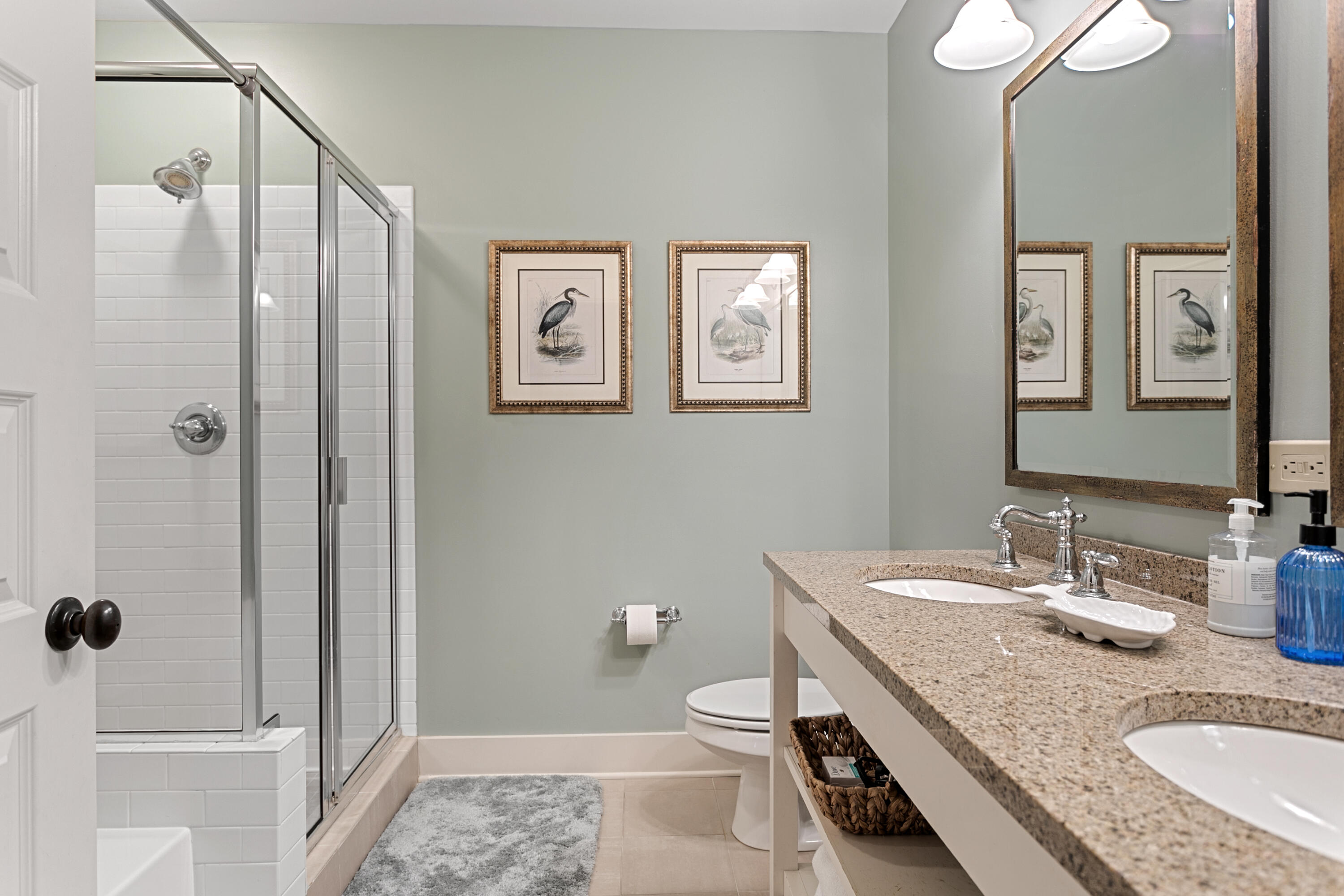 2050 West County Highway 30A, Unit M1314 Santa Rosa Beach, FL 32459 - Photo 53 of 79 a bathroom with a granite countertop sink a mirror a shower and a toilet