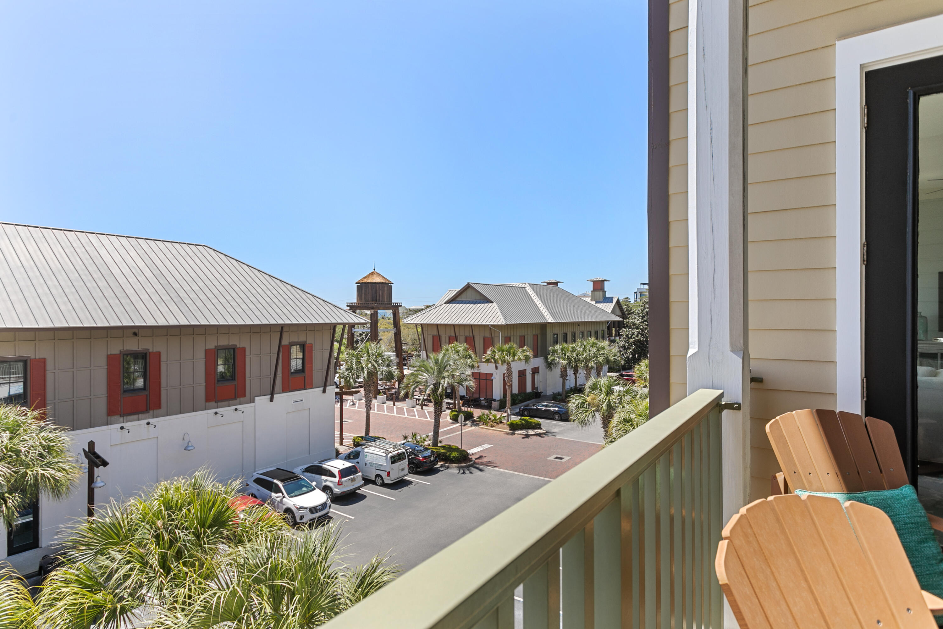2050 West County Highway 30A, Unit M1314 Santa Rosa Beach, FL 32459 - Photo 61 of 79 a view of a patio with couches table and chairs and potted plants