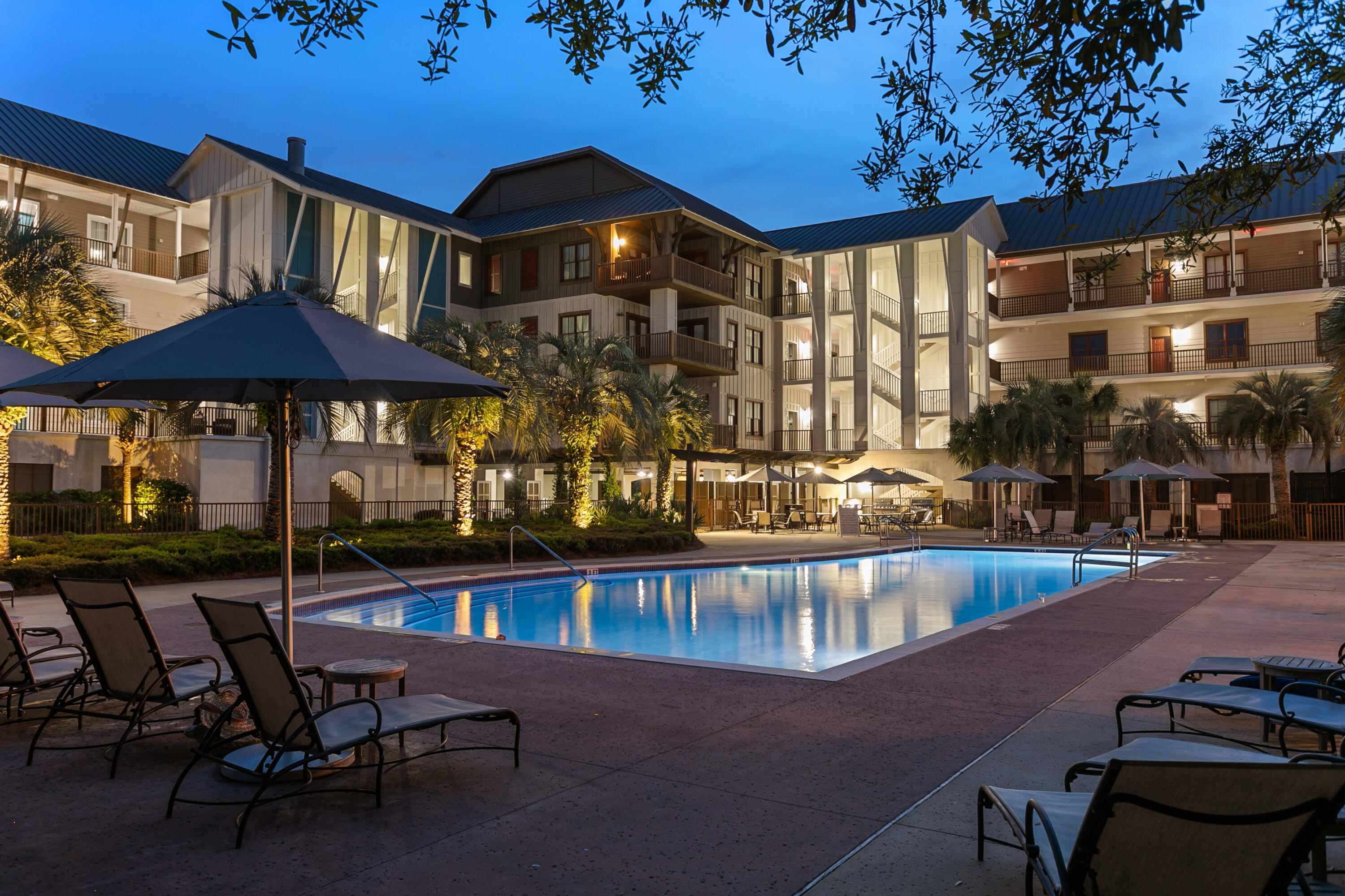 2050 West County Highway 30A, Unit M1314 Santa Rosa Beach, FL 32459 - Photo 69 of 79 a view of a chairs and table in the patio