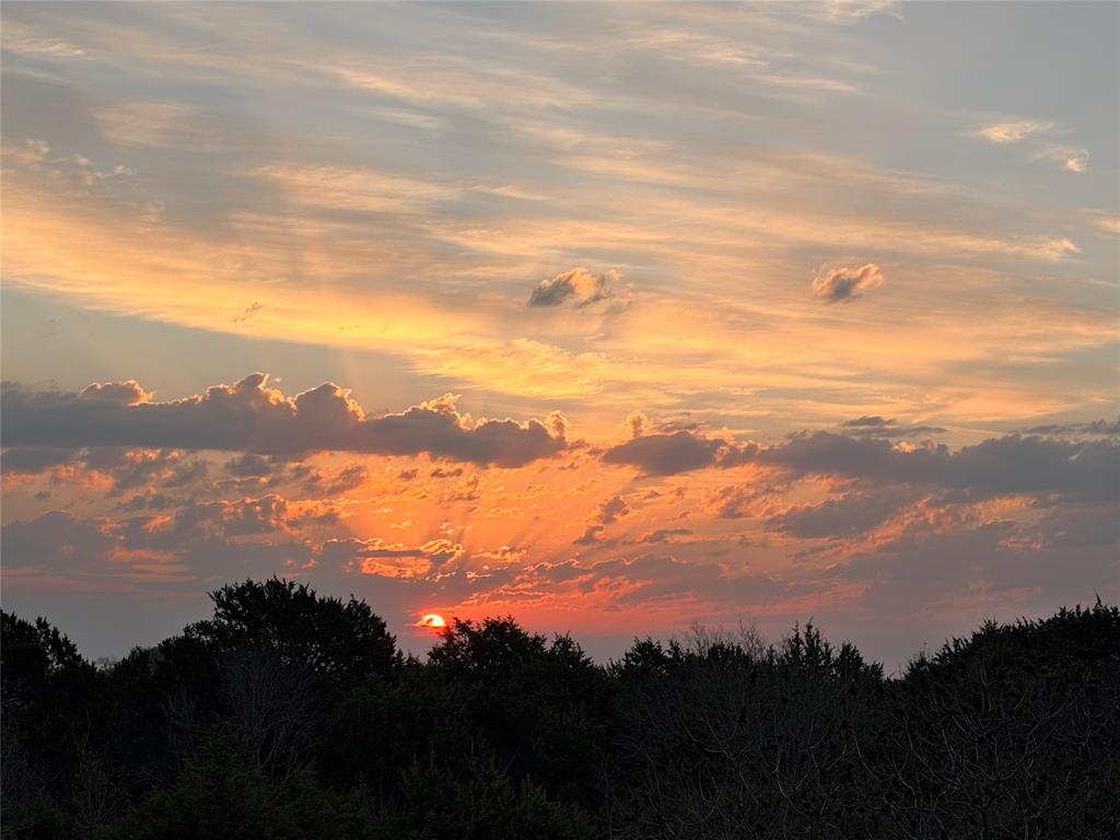 2100 Shady Grove Road Weatherford, TX 76088 - Photo 38 of 38 Sunrise from the back porch. No West sun!