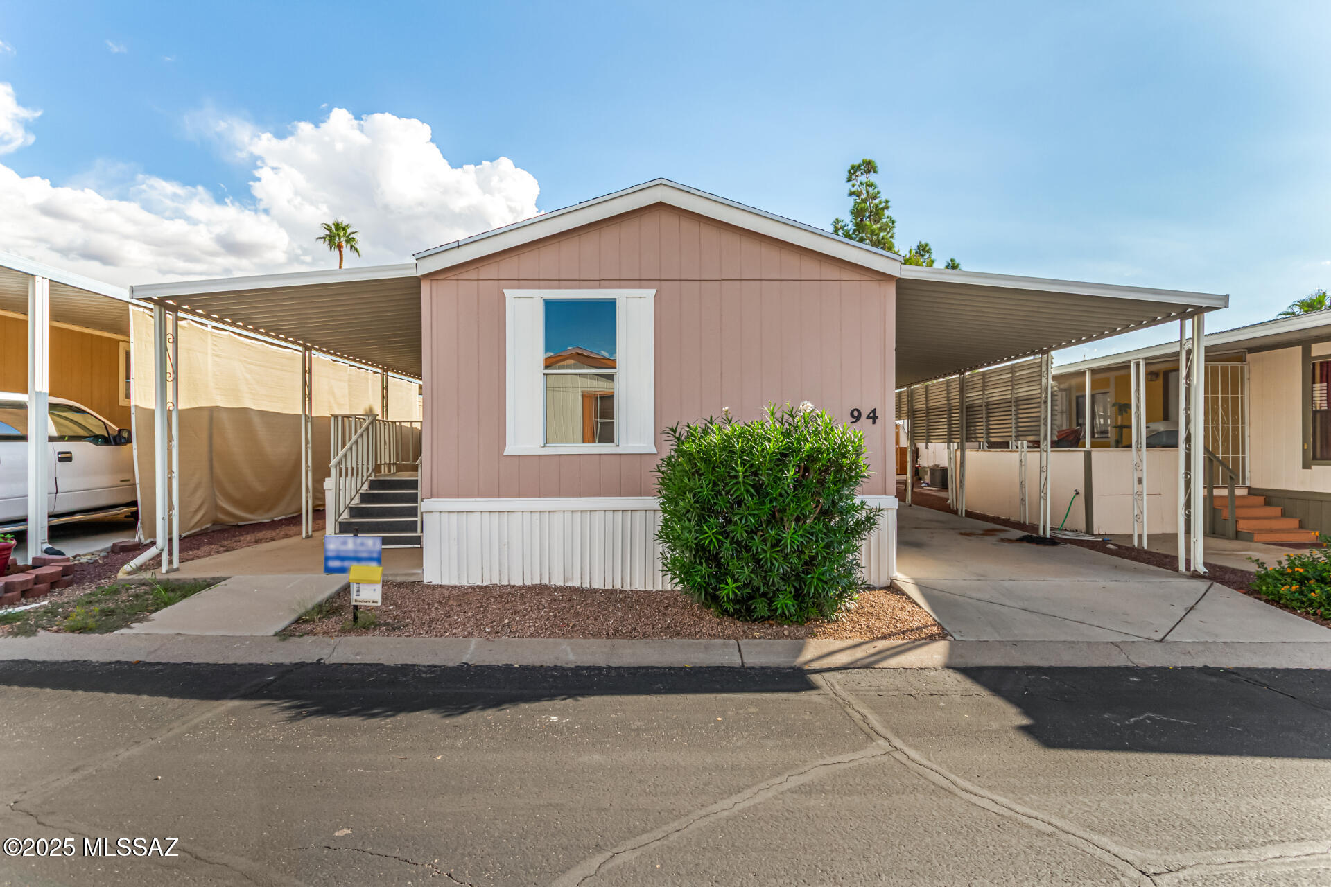 8401 South Kolb Road, Unit 94 Tucson, AZ 85756 - Photo 24 of 24 a view of a house with a street