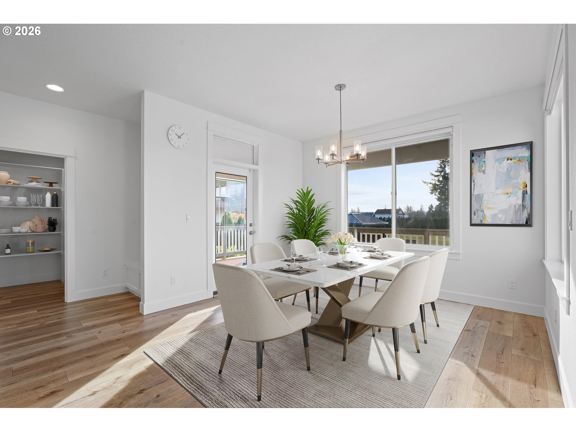 14146 South Cleveland Street Oregon City, OR 97045 - Photo 16 of 46 a view of a dining room with furniture window and wooden floor