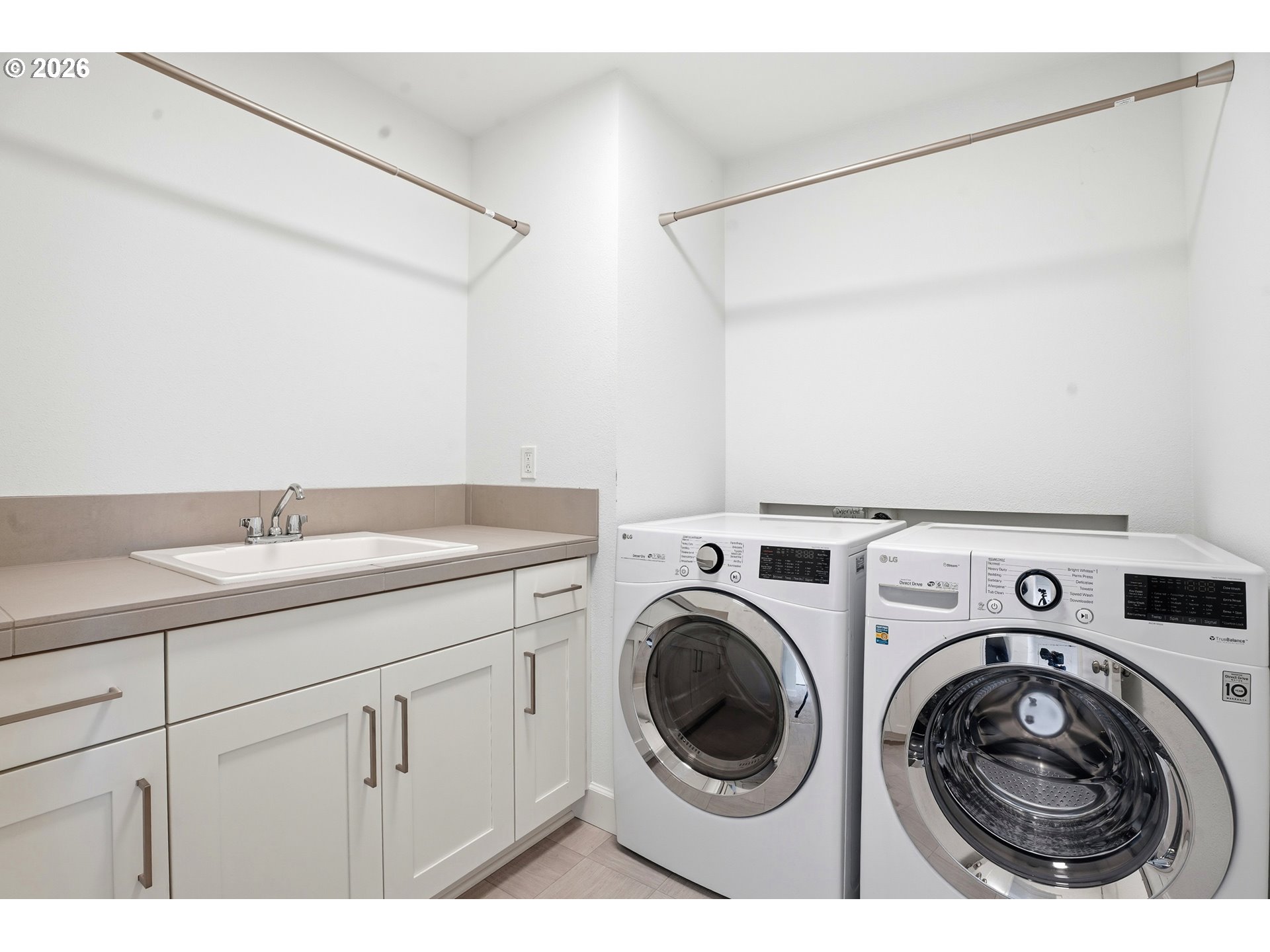 14146 South Cleveland Street Oregon City, OR 97045 - Photo 27 of 46 a utility room with dryer and washer