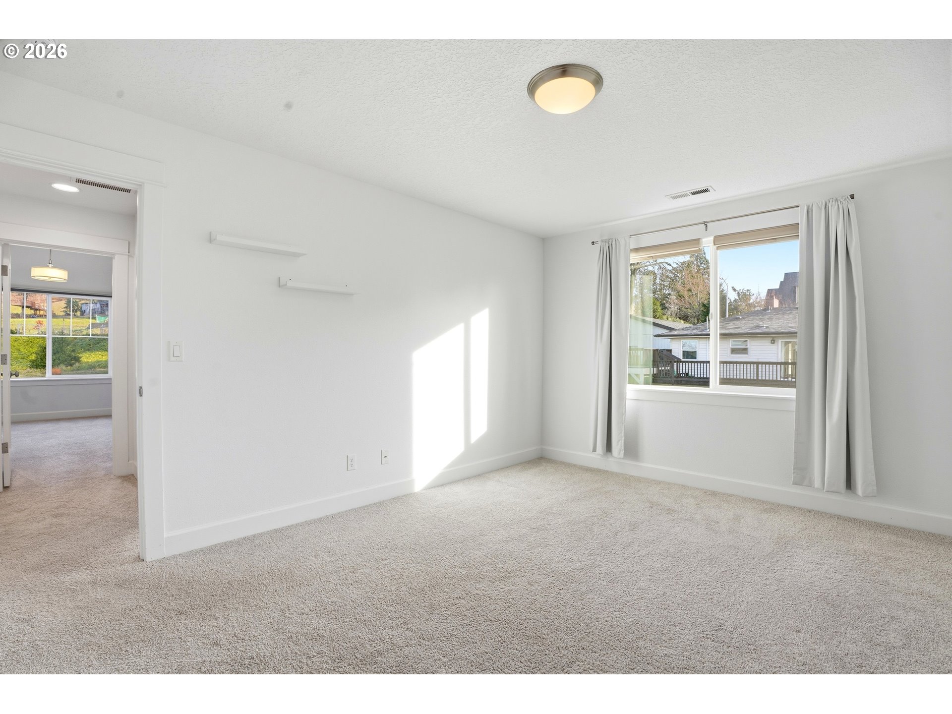 14146 South Cleveland Street Oregon City, OR 97045 - Photo 29 of 46 a view of an empty room with a window
