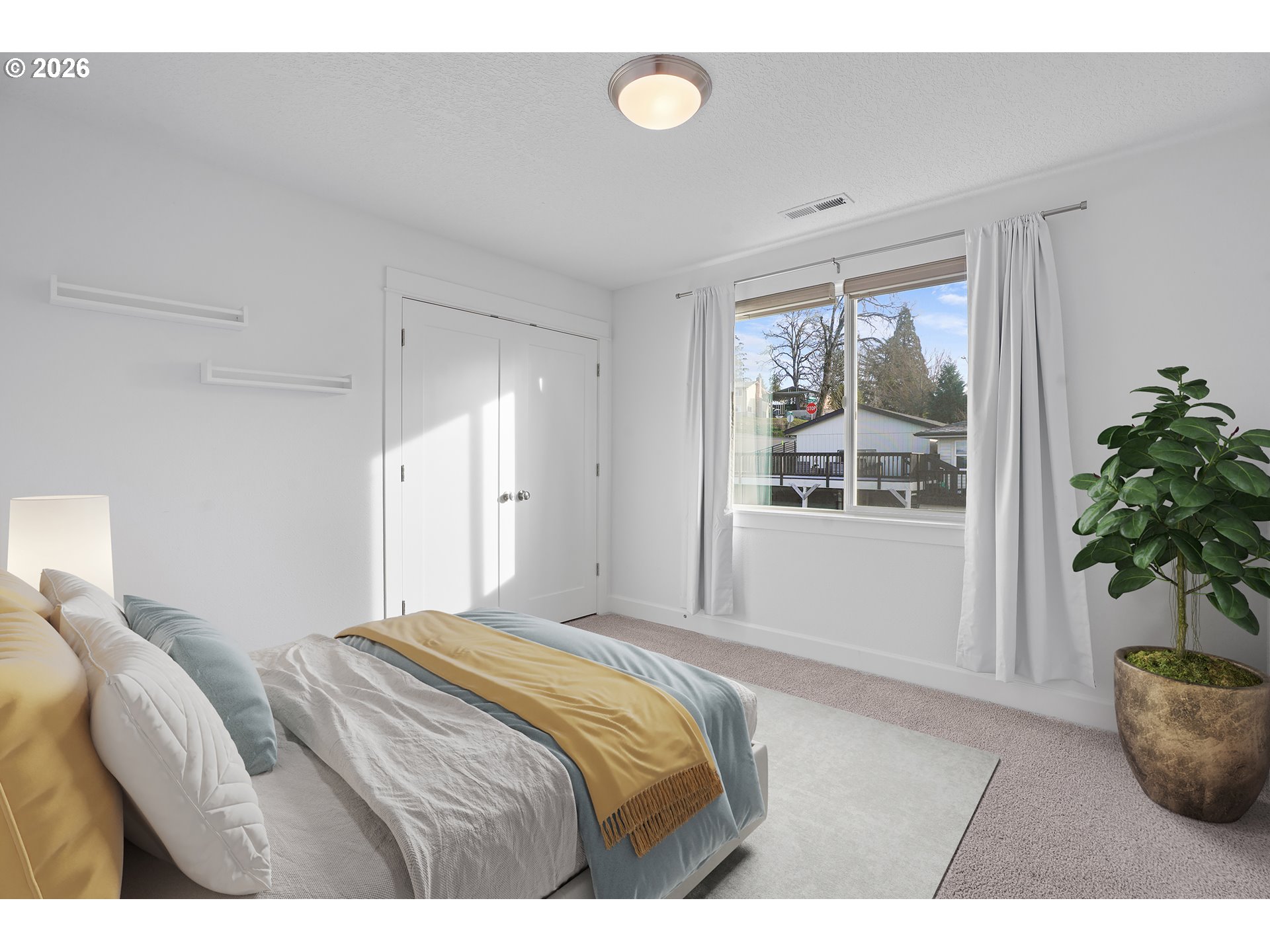 14146 South Cleveland Street Oregon City, OR 97045 - Photo 30 of 46 a bedroom with a bed and a window