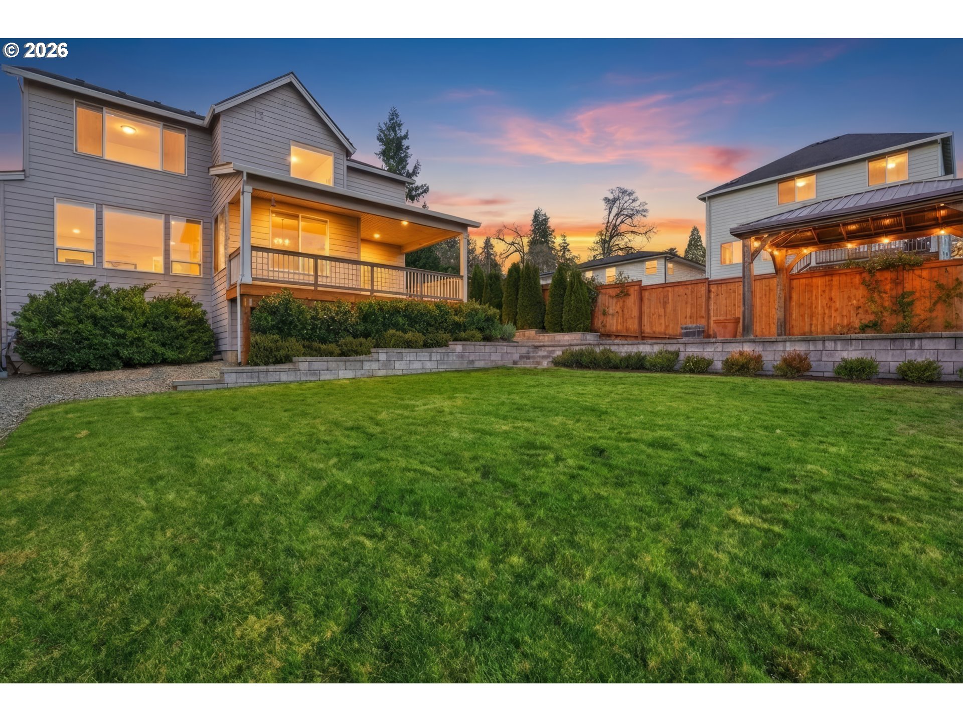 14146 South Cleveland Street Oregon City, OR 97045 - Photo 39 of 46 a view of a house with a big yard and potted plants