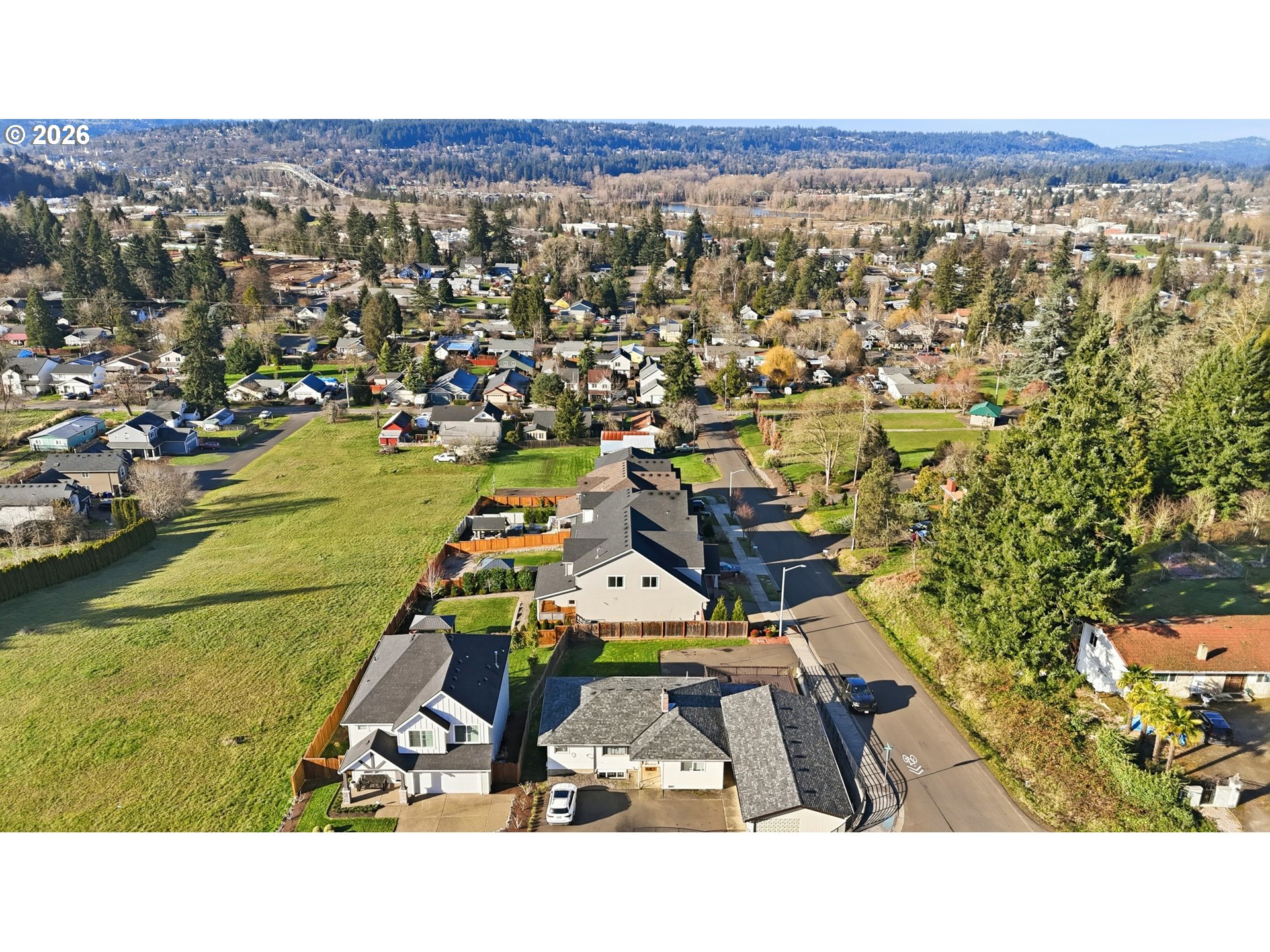 14146 South Cleveland Street Oregon City, OR 97045 - Photo 43 of 46 an aerial view of residential houses with outdoor space