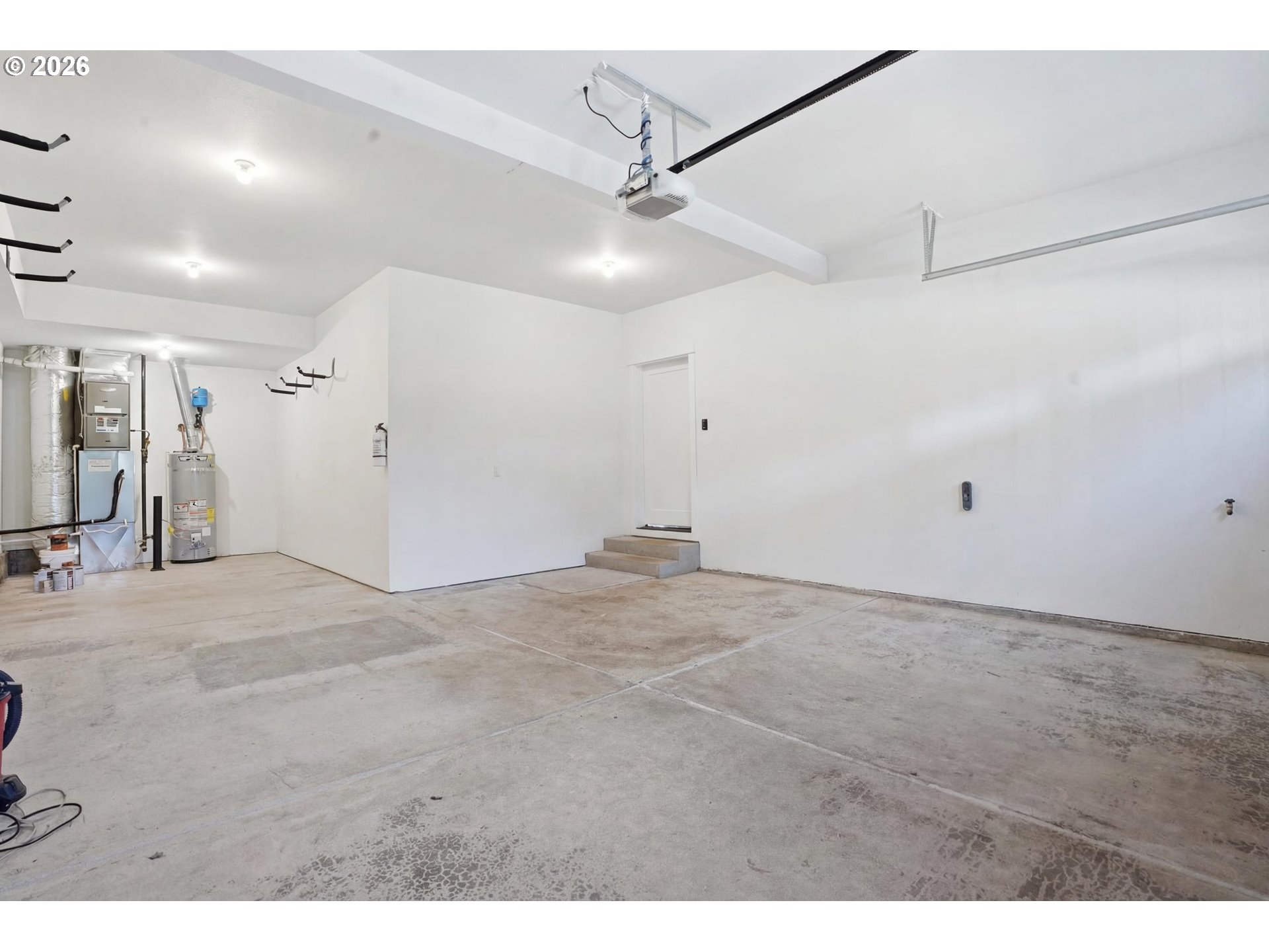 14146 South Cleveland Street Oregon City, OR 97045 - Photo 46 of 46 a view of a livingroom with a ceiling fan and window