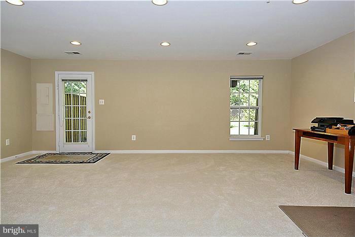 13606 Mills Farm Road Rockville, MD 20850 - Photo 21 of 30 Lower level family room with new carpet!