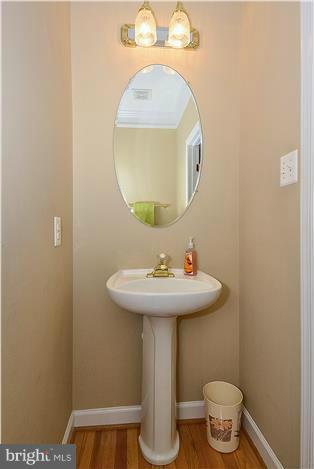 13606 Mills Farm Road Rockville, MD 20850 - Photo 7 of 30 Main level powder room.
