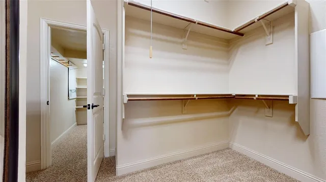 a room with furniture and a window