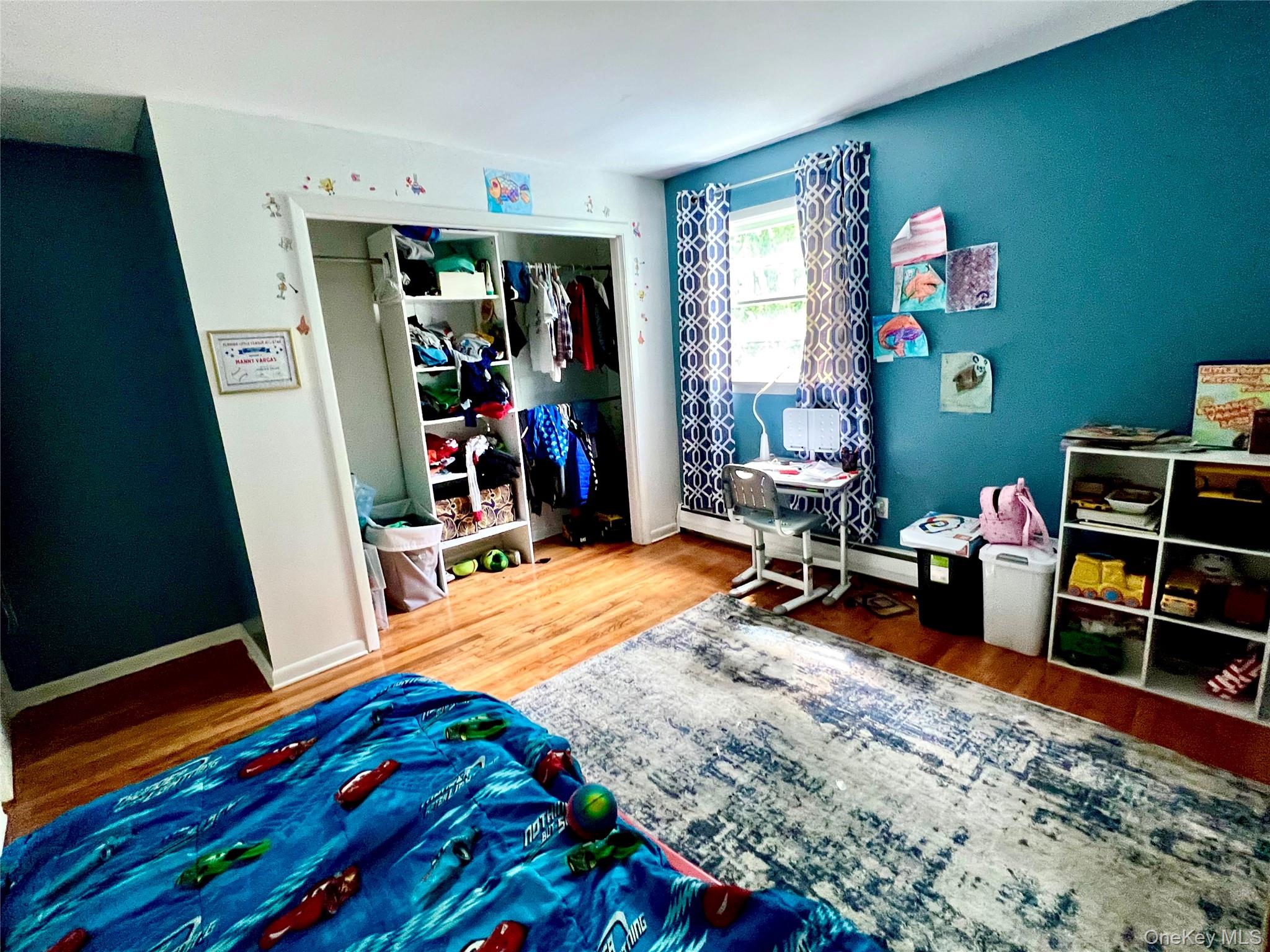 26 Orange Road Florida, NY 10921 - Photo 22 of 39 a room with furniture and a wooden floor