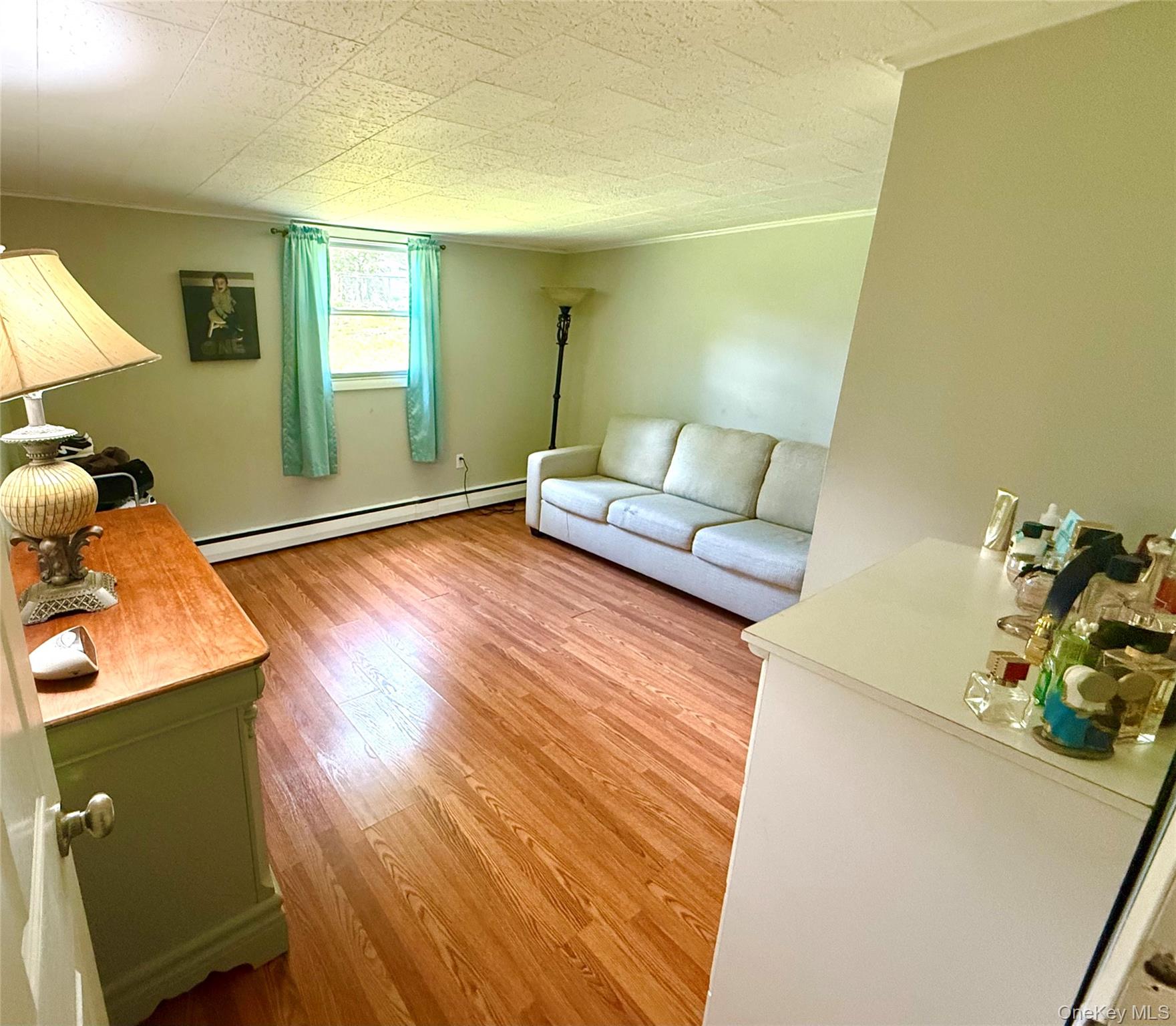 26 Orange Road Florida, NY 10921 - Photo 26 of 39 a living room with furniture and a wooden floor