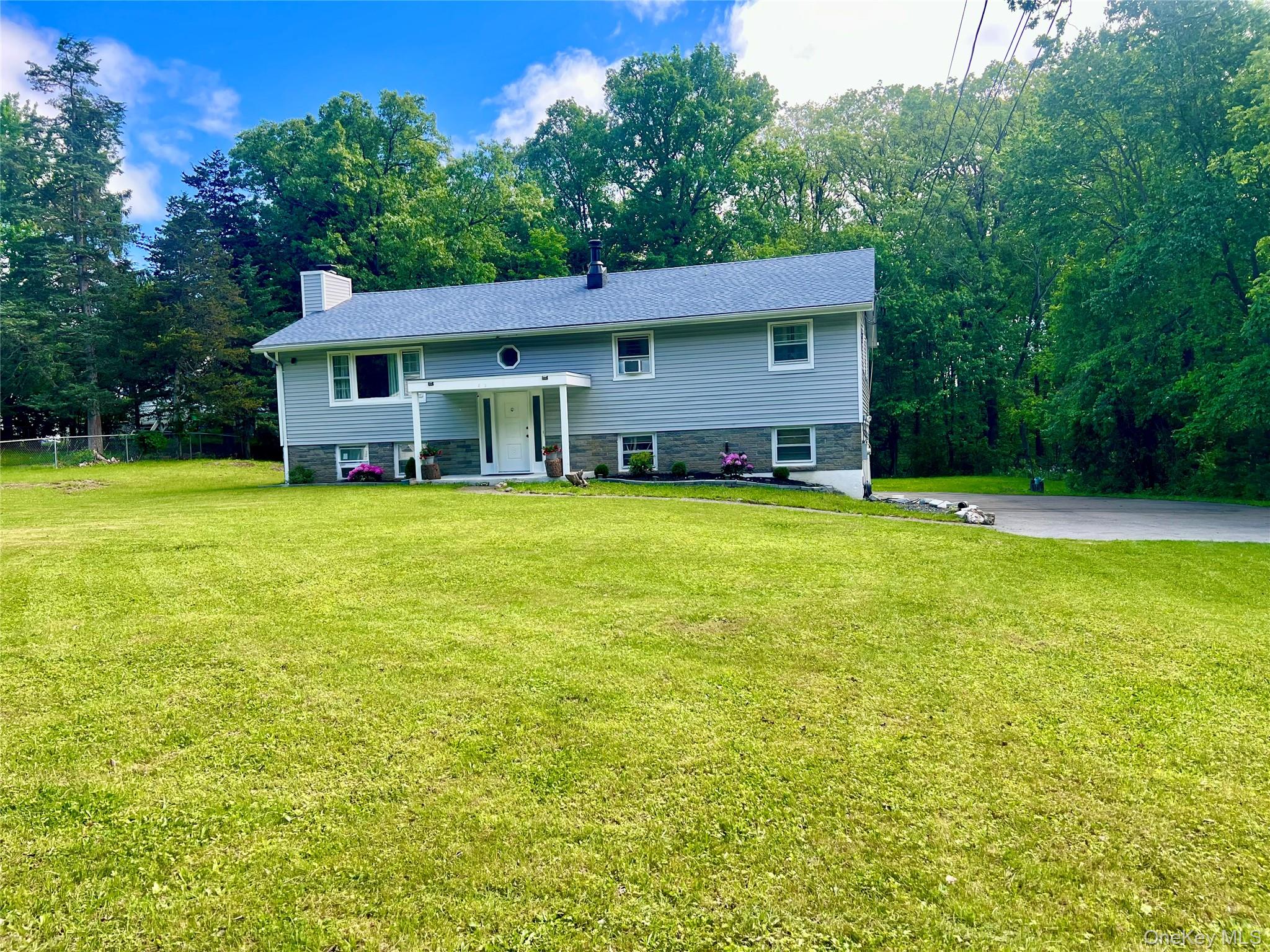 26 Orange Road Florida, NY 10921 - Photo 38 of 39 a view of a house with a yard