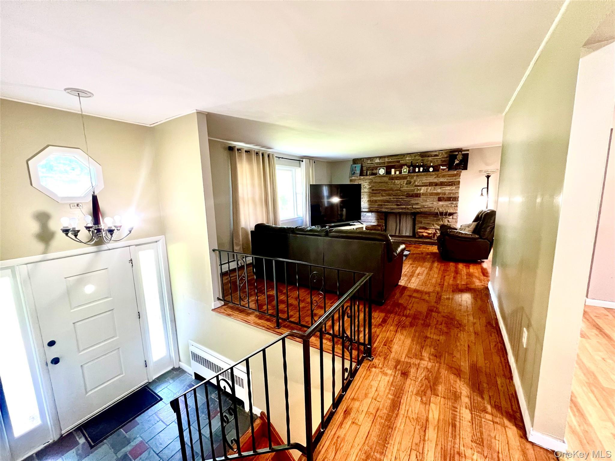26 Orange Road Florida, NY 10921 - Photo 6 of 39 a living room with furniture and a wooden floor