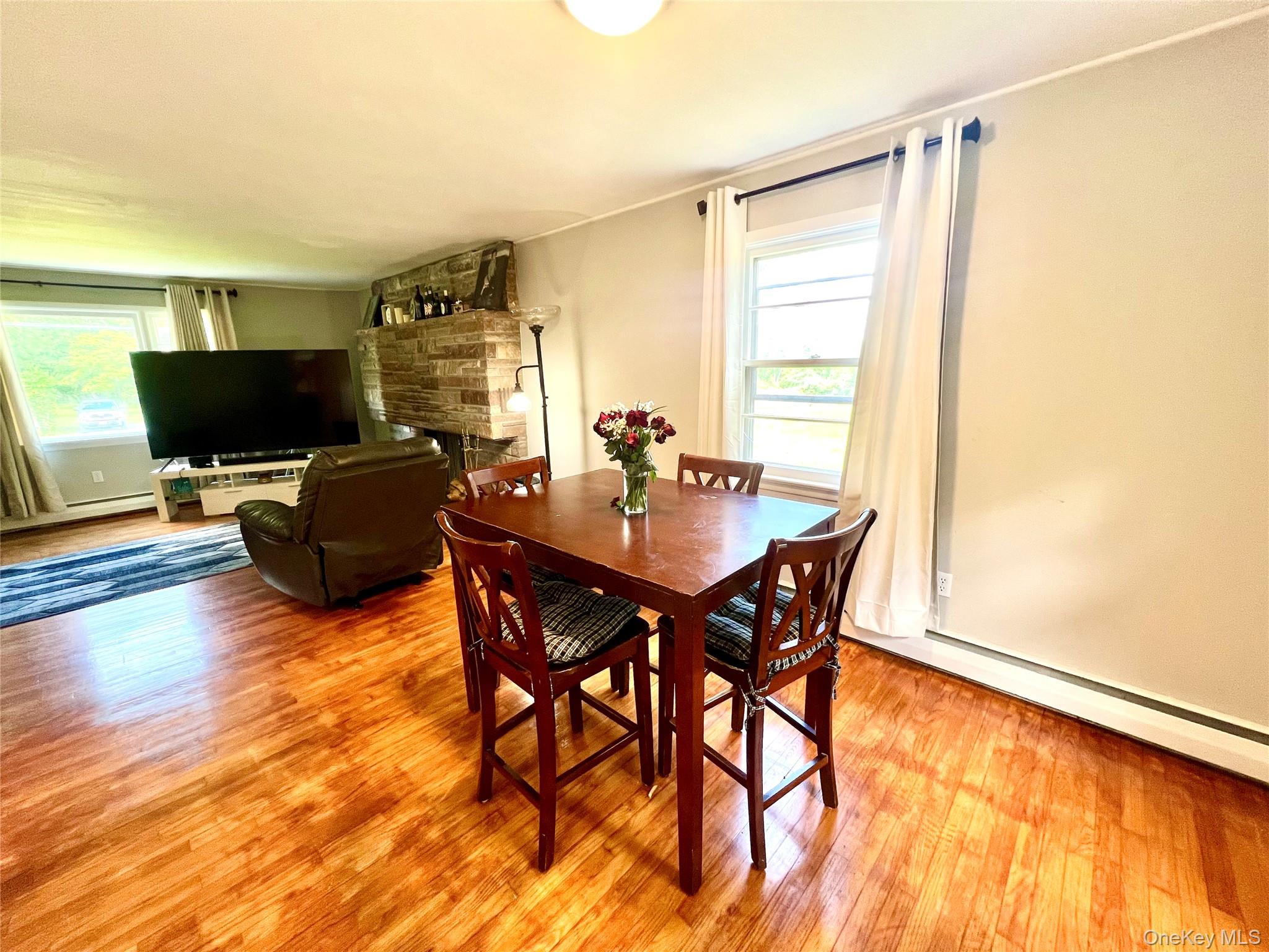 26 Orange Road Florida, NY 10921 - Photo 10 of 39 a dining room with furniture and wooden floor